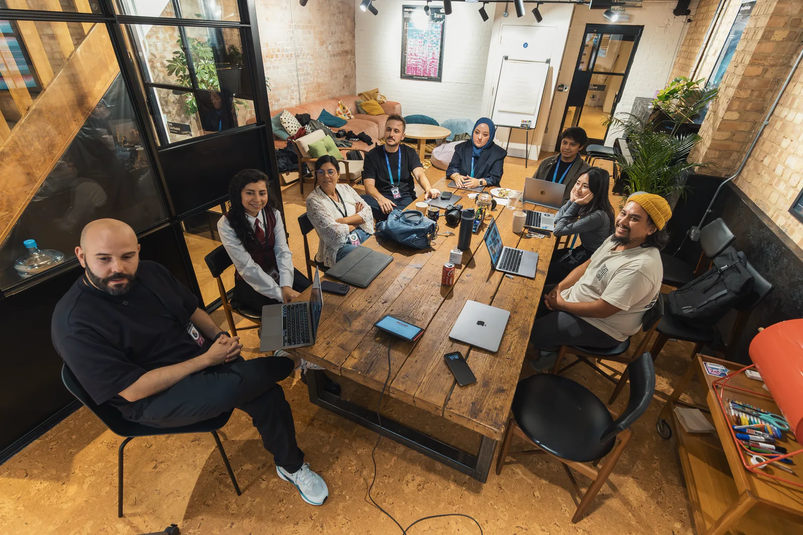VendrNova team collaborating around a table